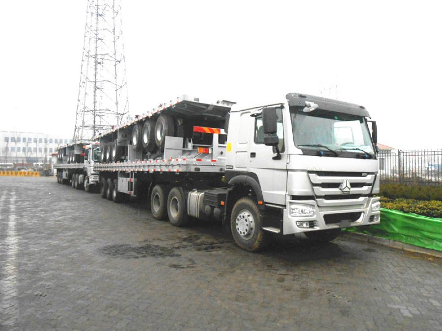 5 units Howo tractor truck and flatbed trailer loaded on the ship for the Ghana Customer 5 units Howo tractor truck and flatbed trailer loaded on the ship for the Ghana Customer